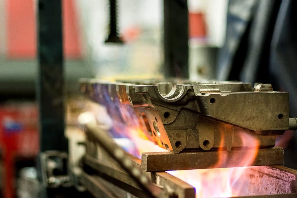 Straightening the head using a flame press
